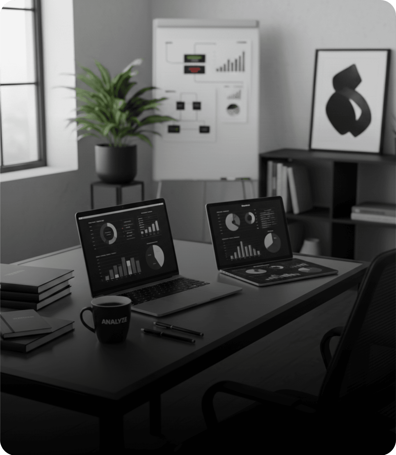 Two laptops displaying performance dashboards