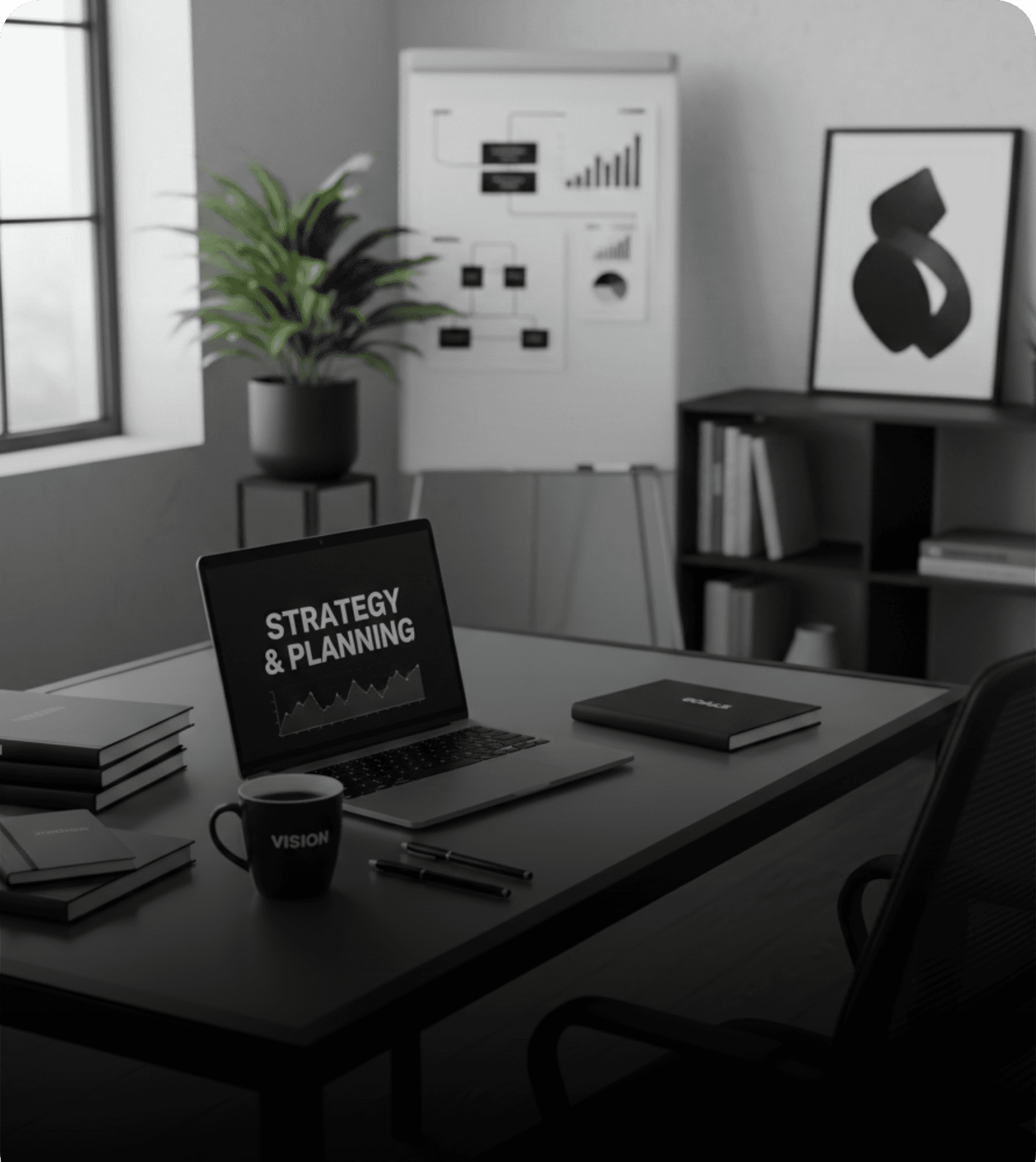 Desk with a laptop open to a strategy and planning deck